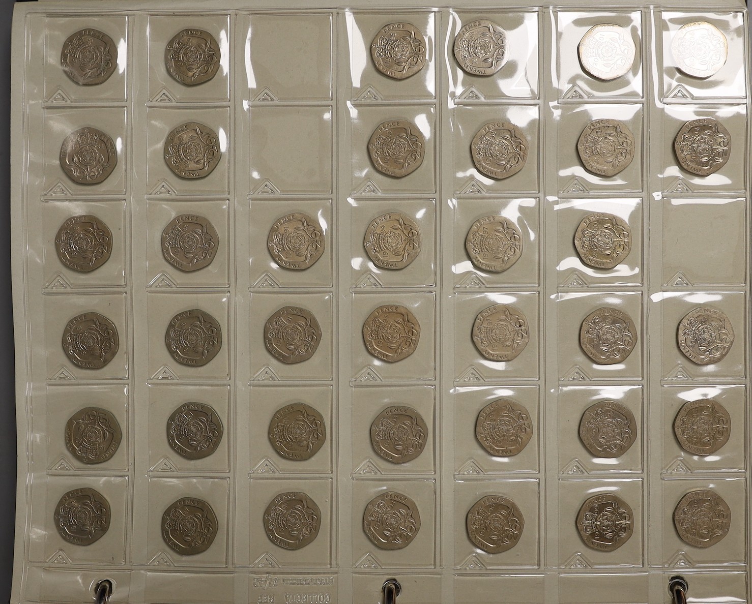 An album of British crowns, halfcrowns, florins and decimal 50 pence and 20 pence coins, including 1819 crown F, etc. and various loose UK coins and banknotes in envelopes